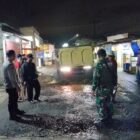 LURAH PAKUHAJI MEMBERIKAN PERBAIKI DARURAT JALAN YANG BECEK.